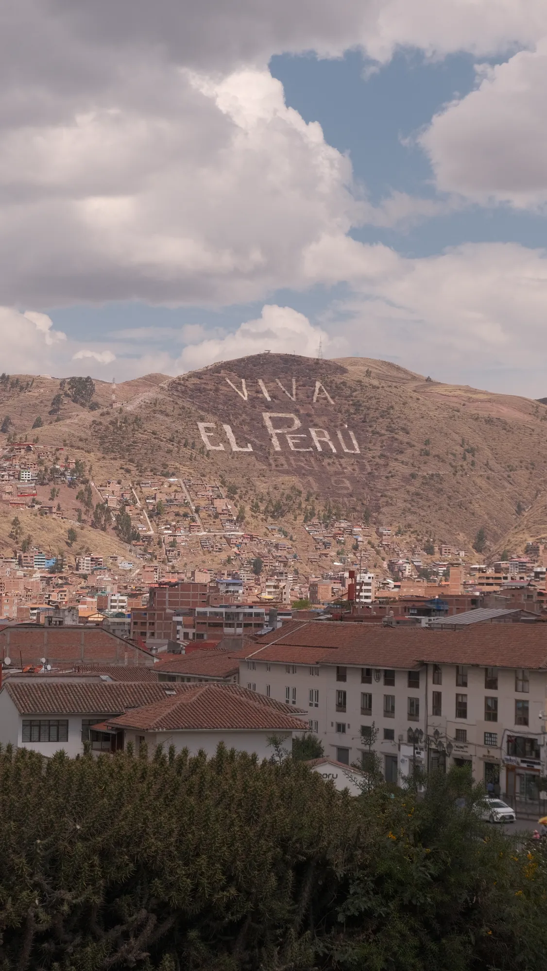 Cusco's rooftops in the afternoon light, seen from central Cusco.