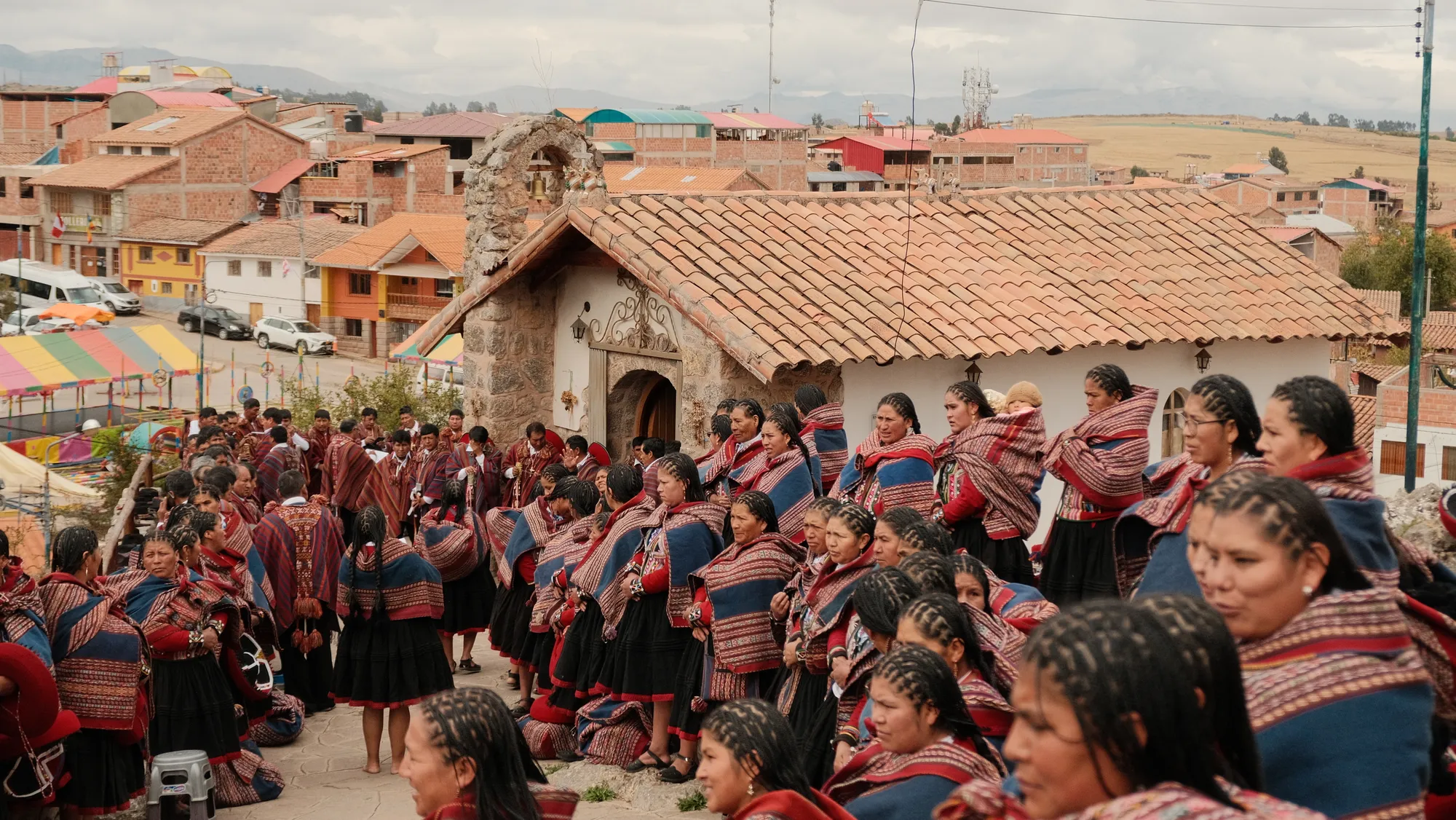 Woven textiles and wool at a highland farm and weaving stop near Chinchero.